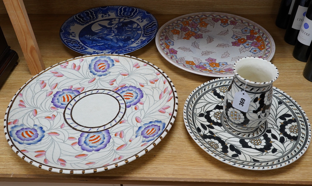 Two Charlotte Rhead signed chargers, a similar signed matching plate and vase and a ‘Mikado’ Burslem blue and white Oriental style charger designed by Frederick Rhead, largest 45cm diameter. Condition - good